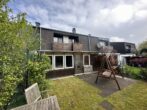 Attraktives Einfamilienhaus in Split-Level-Bauweise mit schnuckeligem Garten in Beuel-Bechlinghoven! - Rückansicht